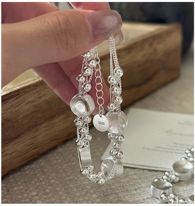 Detailed view of S925 sterling silver multilayer beaded bracelet with adjustable chain
