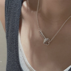 S925 sterling silver key pendant necklace with LOVE WE engraving shown on model
