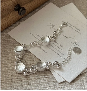 Detail of S925 sterling silver woven bracelet with lobster clasp and hallmark tag