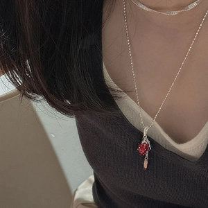S925 sterling silver strawberry pendant necklace on a ball chain worn by model