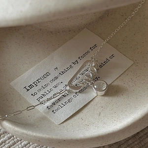 S925 sterling silver necklace featuring a D-shape clasp and a clear round gem pendant