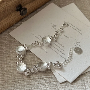 S925 sterling silver multi-layer woven bracelet with beads and round charms on vintage paper