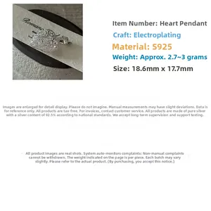 Detailed view of S925 sterling silver hollow heart pendant with vintage texture details