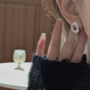 S925 sterling silver matte hoop earrings with crystal bead drop on a model