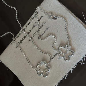 Minimalist S925 sterling silver beaded necklace featuring hollow floral flower pendants