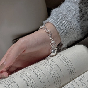 Vintage 925 sterling silver beaded chain bracelet with a polished ball charm for women