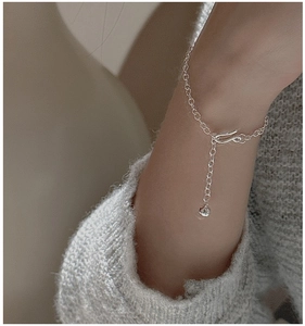 Close-up of S925 sterling silver minimalist bracelet with U-shaped clasp and extender