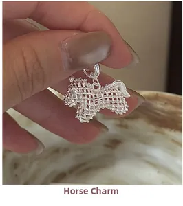 Macro view of S925 sterling silver pony pendant with hollow mesh texture detail
