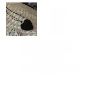 Detail of S925 sterling silver heart necklace with black pendant and 94cm woven cord