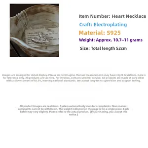 Detailed view of S925 sterling silver hollow heart necklace with 52cm chain dimensions