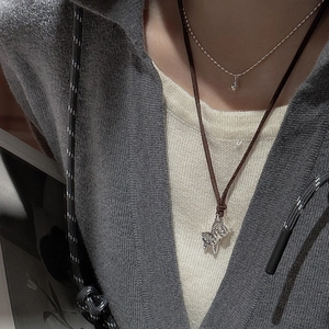 S925 silver double-layer necklace with a delicate zebra pendant and brown wax cord
