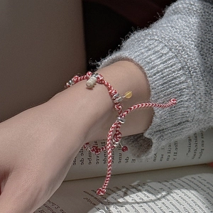 S925 silver retro woven red and white rope bracelet with beads on female wrist
