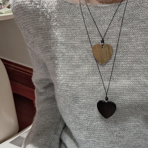 Minimalist S925 silver heart pendants with wood grain and glossy finish on a neck cord