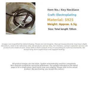 Macro detail of S925 sterling silver key pendant with 100cm vintage cord necklace