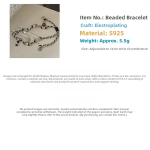 Detail of S925 sterling silver braided bracelet with 16cm adjustable chain and silver beads