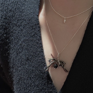 Double-layered S925 sterling silver necklace with minimalist drop and bohemian fringe pendant