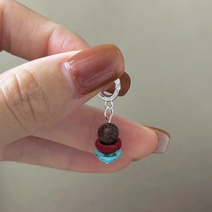 S925 sterling silver pendant with wood bead, red woven disk and turquoise stone