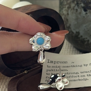 S925 sterling silver flower earrings with blue stone and teardrop metal pendant