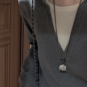 Retro S925 silver elephant pendant necklace with white shell on brown woven cord
