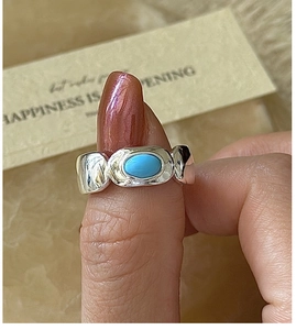 Macro shot of S925 sterling silver ring featuring a vintage oval turquoise stone inlay