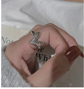Close-up of S925 silver L-shaped ring featuring a unique hammered texture and vintage finish