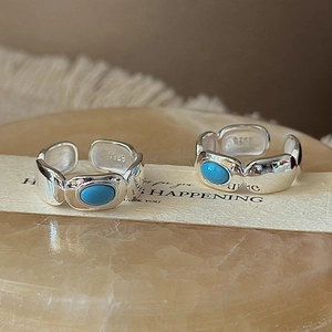 Vintage S925 sterling silver adjustable rings featuring oval turquoise stones on stone base