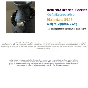 Macro detail of S925 sterling silver black agate bracelet with textured metal bead