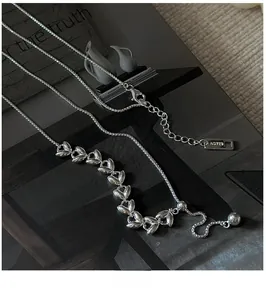 Detailed view of S925 sterling silver wheat ear necklace with AG925 hallmark