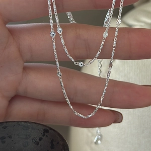 Elegant S925 sterling silver twist rope chain necklace with diamond-cut faceted beads
