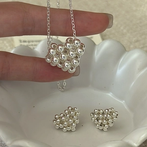 S925 sterling silver jewelry set featuring beaded heart necklace and stud earrings