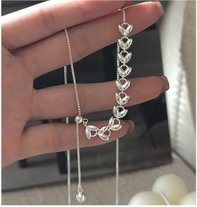 Detail view of S925 sterling silver wheat leaf necklace with adjustable slider clasp