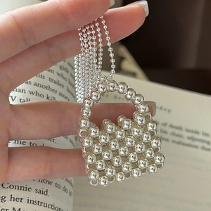 Minimalist S925 sterling silver beaded mini bag pendant necklace for women in retro style