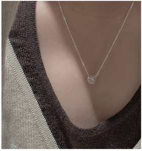 Minimalist S925 silver necklace featuring a tiny cylindrical pendant on a cable chain