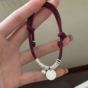 Handmade S925 sterling silver red cord bracelet with mini bell and round tag charms