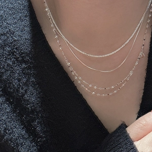 Minimalist S925 sterling silver layered necklace with yellow crystal charm on model