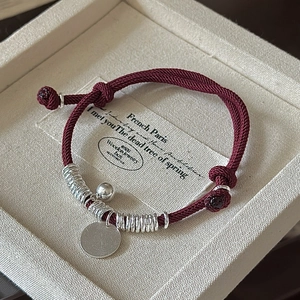 Minimalist S925 sterling silver red cord bracelet with bell and round tag in gift box