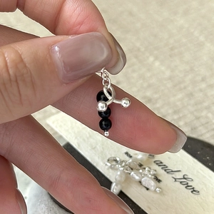 Minimalist S925 silver flower pendant with three black onyx beads in a modern design