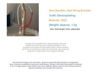 Detail of S925 sterling silver red string bracelet with adjustable beads and coin charm