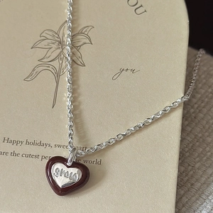 S925 sterling silver heart necklace with 'grow' engraving on rustic display card