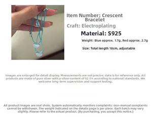 Detailed view of S925 silver crescent moon charm bracelet with adjustable blue woven cord