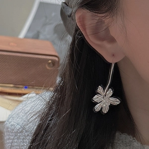 Elegant S925 sterling silver multilayer flower drop earrings on a model profile