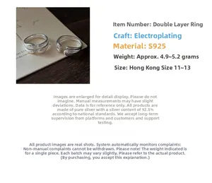 Detailed view of S925 sterling silver layered ring showing weight and material specs