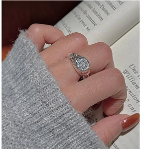 Macro shot of S925 sterling silver hexagram star ring with vintage embossed textures
