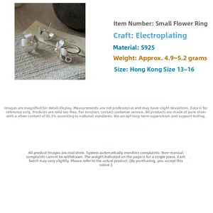 Detailed view of S925 sterling silver flower ring set with pearls and textured finish