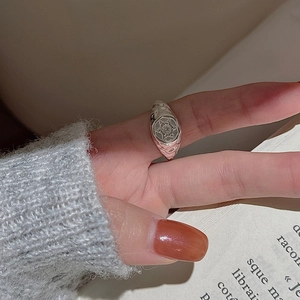 Minimalist S925 sterling silver signet ring with engraved hexagram worn by a model