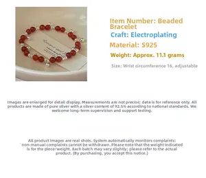 Detail view of S925 sterling silver red agate bead bracelet with bell charm, weight 11.1g
