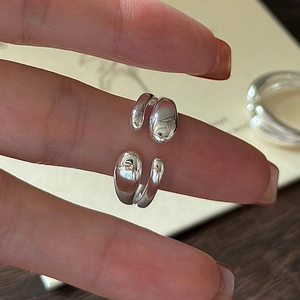 Polished S925 sterling silver open ring with a minimalist fluid pebble-shaped design