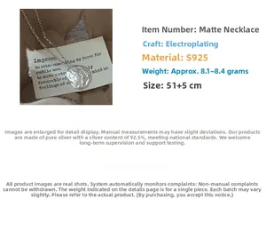 Macro detail of S925 sterling silver matte necklace with vintage relief pendant texture