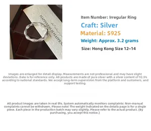 Detailed macro view of S925 sterling silver ring showing irregular texture and silver weight