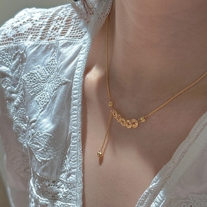 Elegant gold CNC copper coin necklace with minimalist circular charms and drop pendant